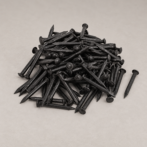 Black steel nails with flat heads and pointed tips