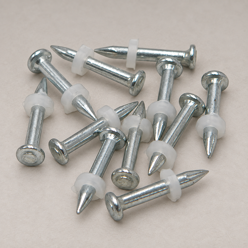 Gun nails with pointed tips and white plastic collars
